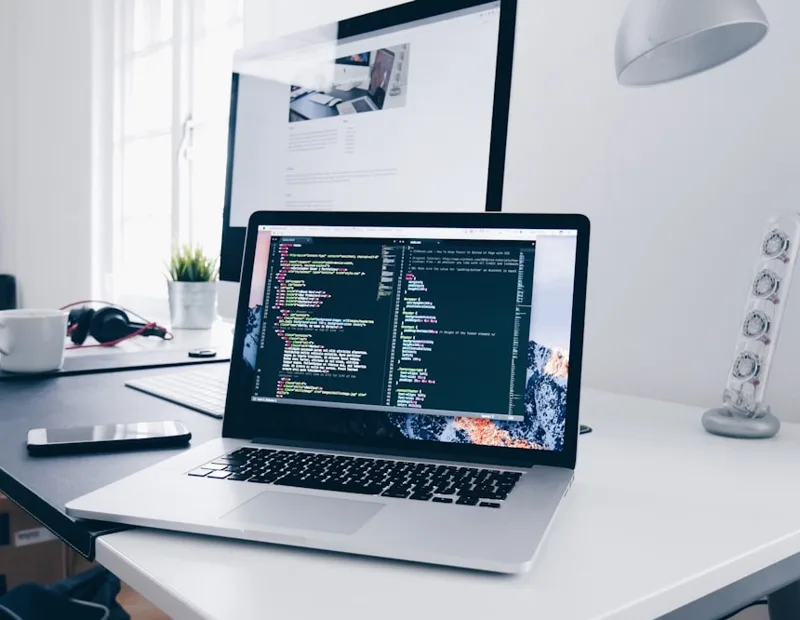A developer integrating the SpamCipher Email Finder API